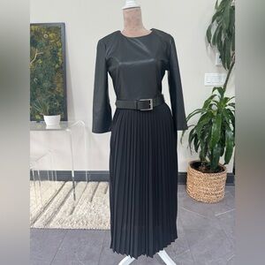 Faux leather and pleated dress with belt